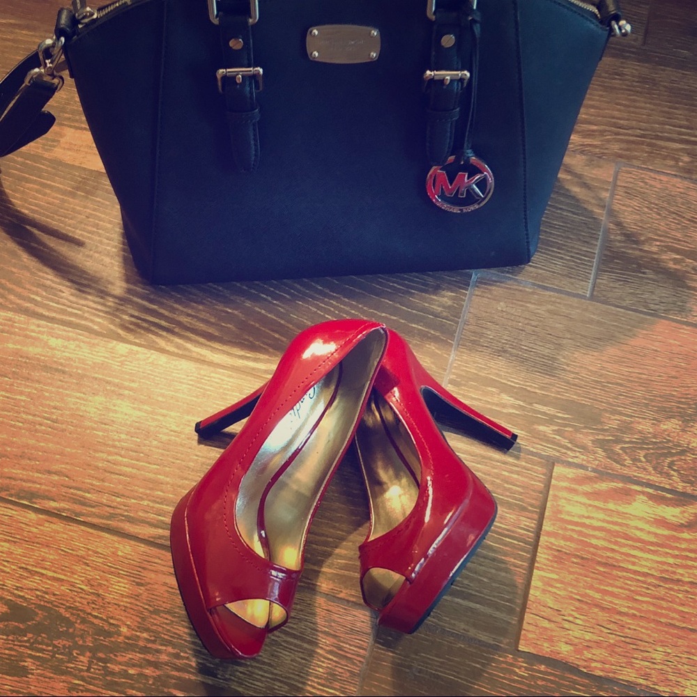 Candie’s Red Peep Toe Pumps